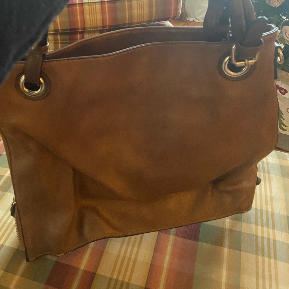 Large purse Brown in color like new smoke free